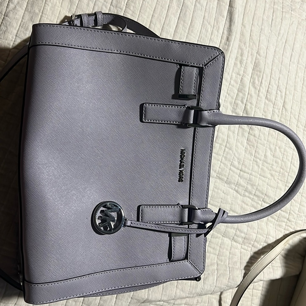 Michael Kors purse. Grayish lavender color with silver accents.